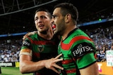 Rabbitohs Sam Burgess and Greg Inglis celebrate in the 2014 NRL grand final against the Bulldogs.