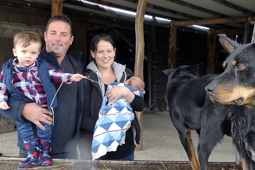 Tasmanian farmers Brad Grattidge and Hayley Newitt and their family