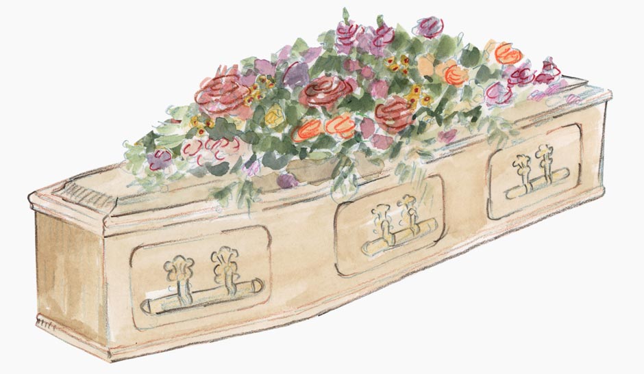 A wooden casket with colourful flowers placed on top.