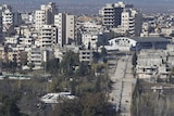 A general view shows the entrance of the Waer district in the central Syrian city of Homs.