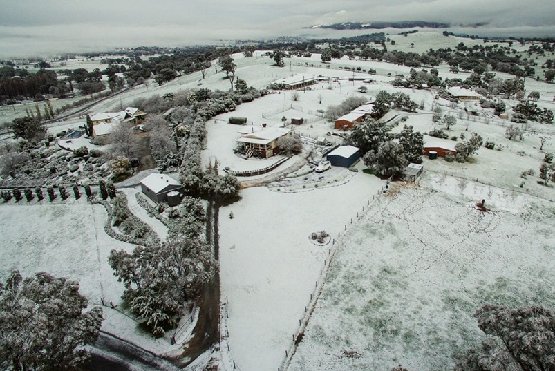 aerial view of a town blanketed in snow