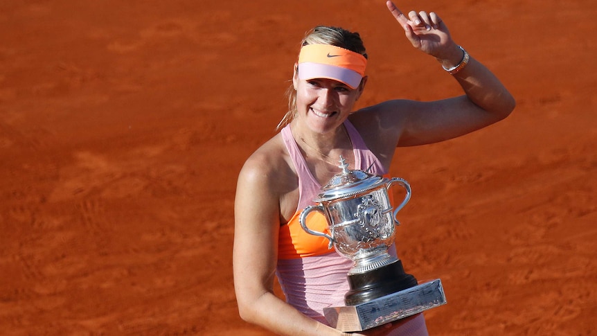 Sharapova celebrates with French Open trophy