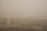 Dusty: Visibility was down to 5,000 metres in Canberra yesterday afternoon.