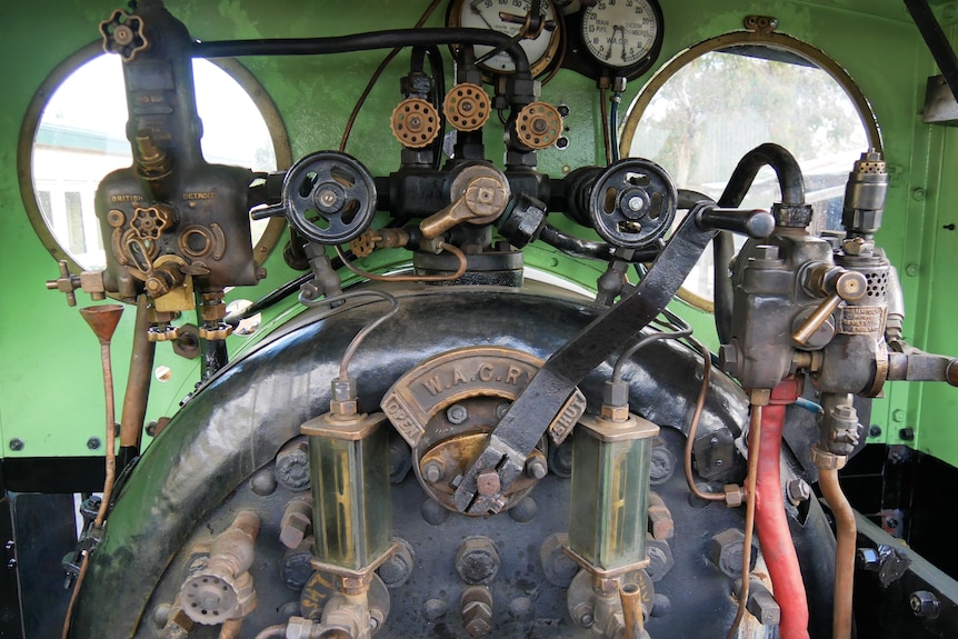 The dashboard of a very old train