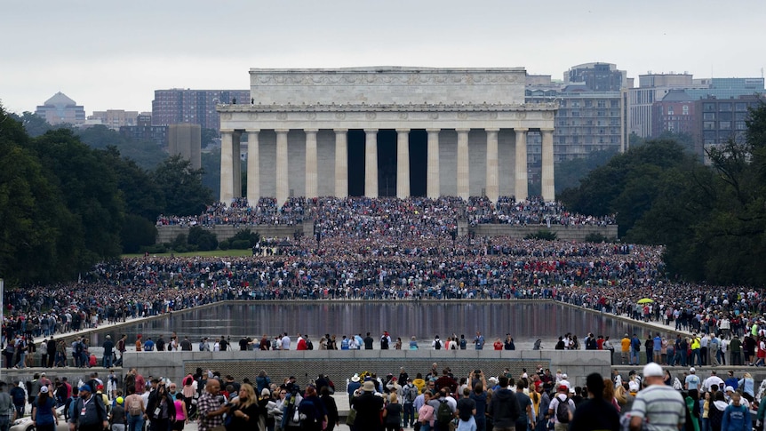 People gather at the Lincoln Memorial for a prayer march led by evangelist Franklin Graham, in Washington, D.C.