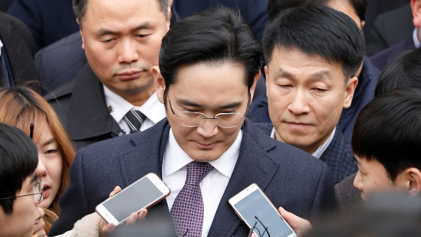Samsung Group chief, Jay Y Lee, leaves after attending a court hearing