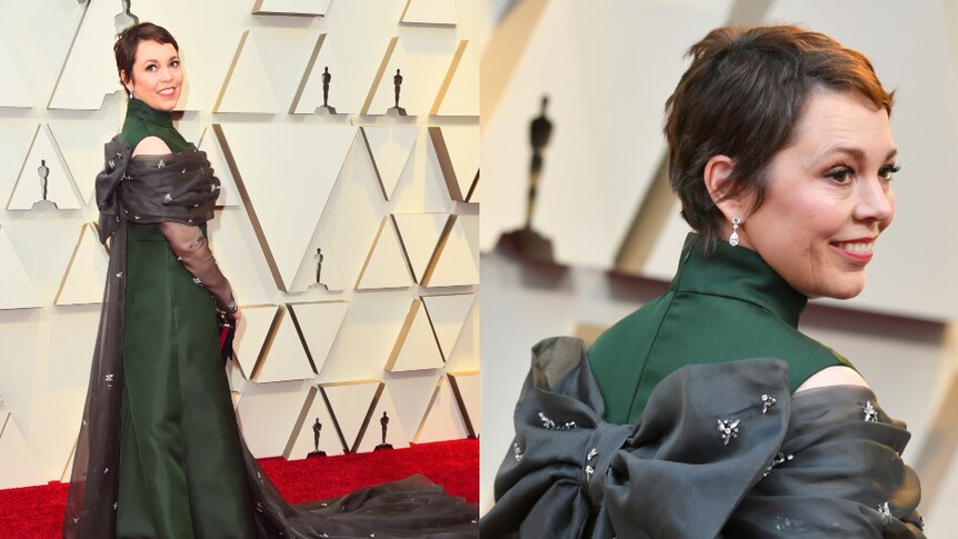 Olivia Colman wears a green satin gown with a brown bow on the back at the Oscars.