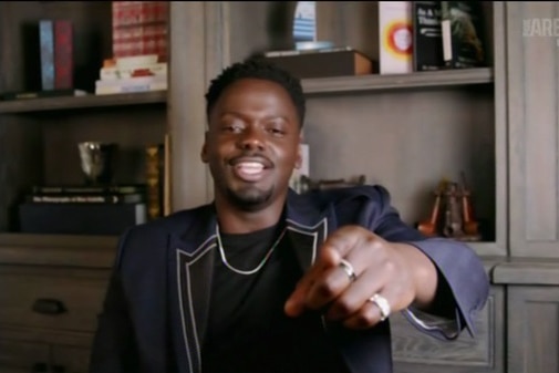 Daniel Kaluuya speaking and gesturing on a video screen.