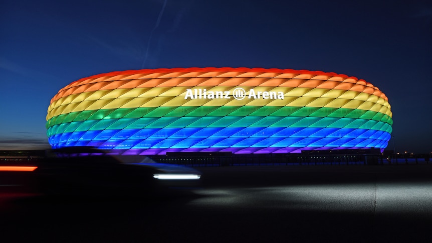 Munich's stadium is illuminated in rainbow colours on the occasion of Christopher Street Day in 2016.