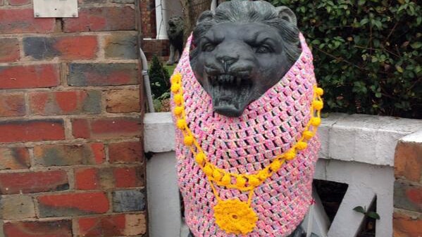 Yarn jacket with mayoral chains outside Geelong Mayor Darryn Lyons' house