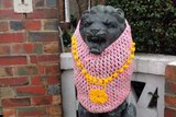 Yarn jacket with mayoral chains outside Geelong Mayor Darryn Lyons' house