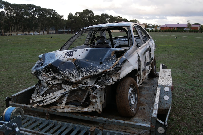 smashed up derby car 