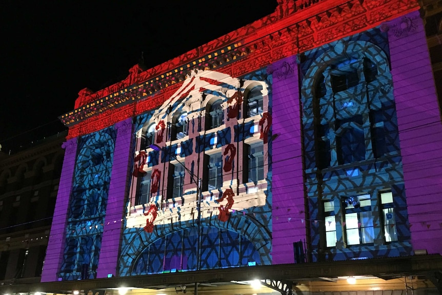 Light show on historic building in Melbourne
