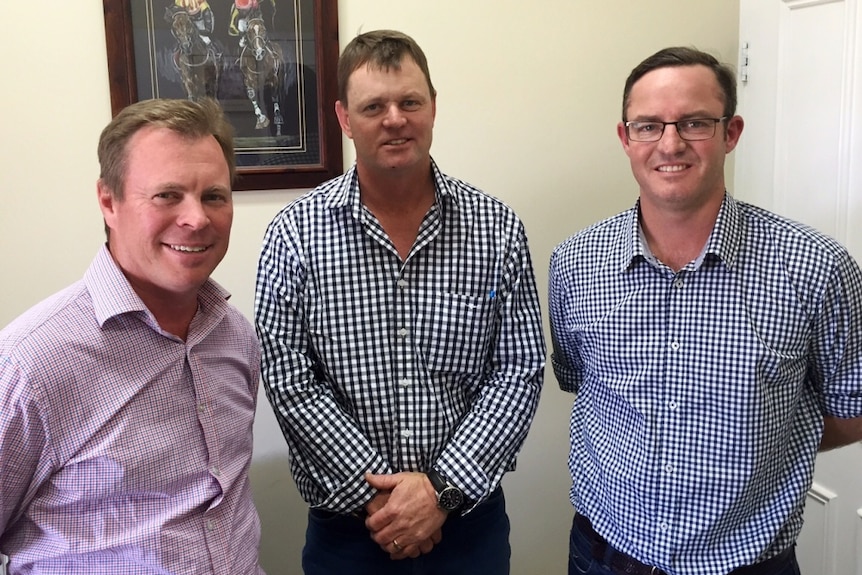 James Maclean, Kurt Wockner and Jamie Ferguson standing in the Glenvale Building at the Toowoomba Showgrounds, Glenvale.