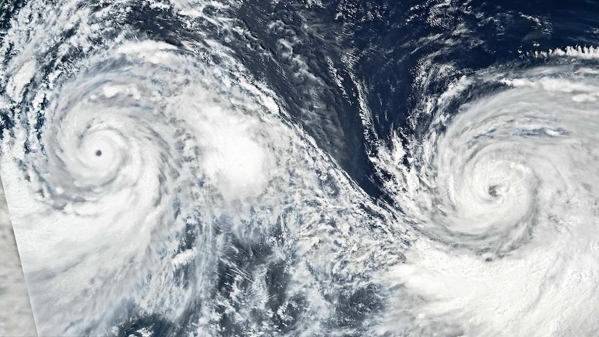 NASA satellite data shows swirling white typhoons Lekima and Krosa about 1,500km apart, eye-to-eye, over the West Pacific
