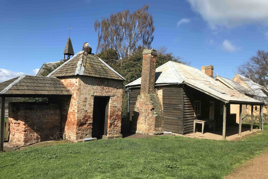 Old brick and weatherboard buildings are in fair condition but showing their age