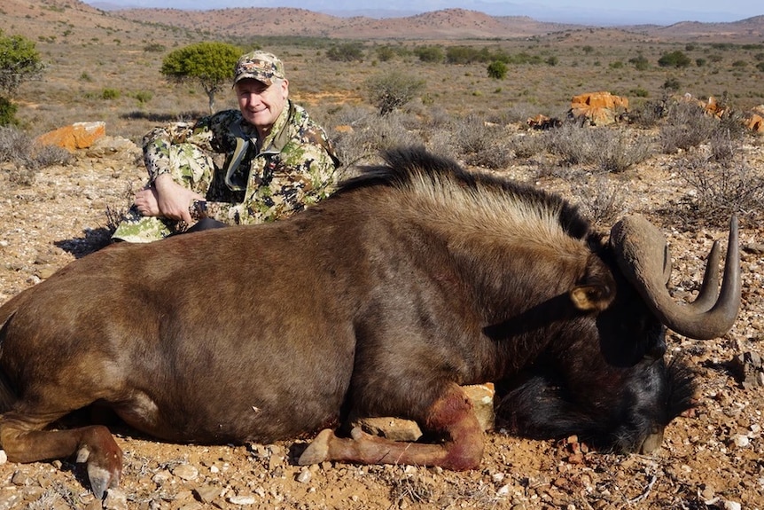 Gold Coast hunter John Hossack with Black Wildebeest at Eastern Cape Royal Karoo Safaris in South Africa