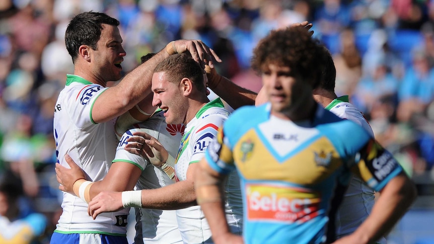 Canberra Raiders players celebrate a try