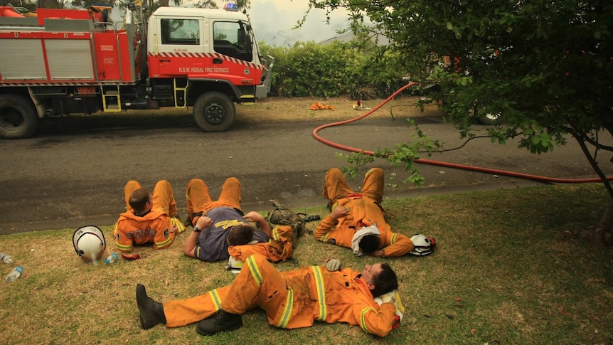 Firefighters rest after back-burning