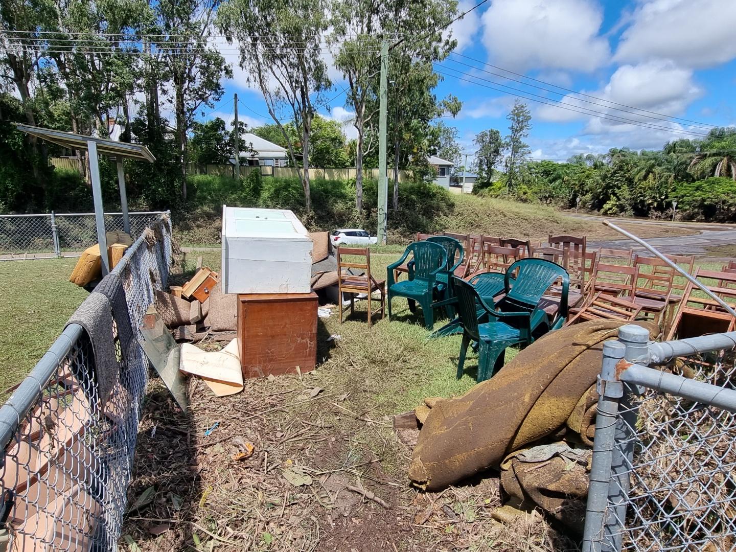 Flooded household goods on the street.