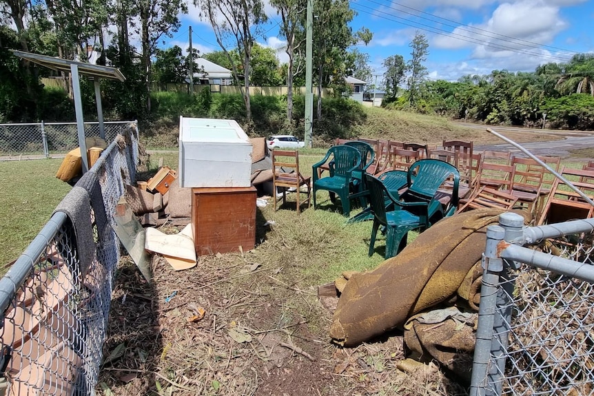 Flooded household goods on the street.