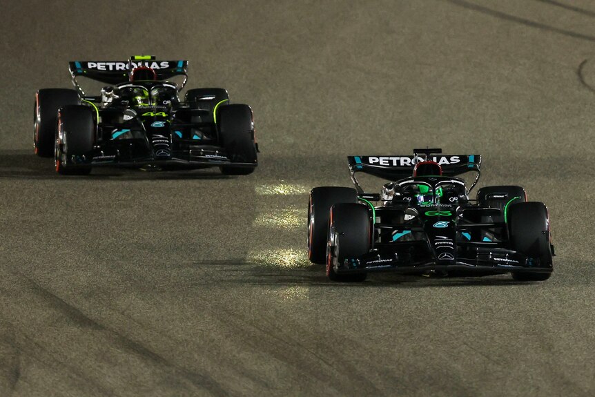 George Russell and Lewis Hamilton driving their Mercedes during F1 qualifying