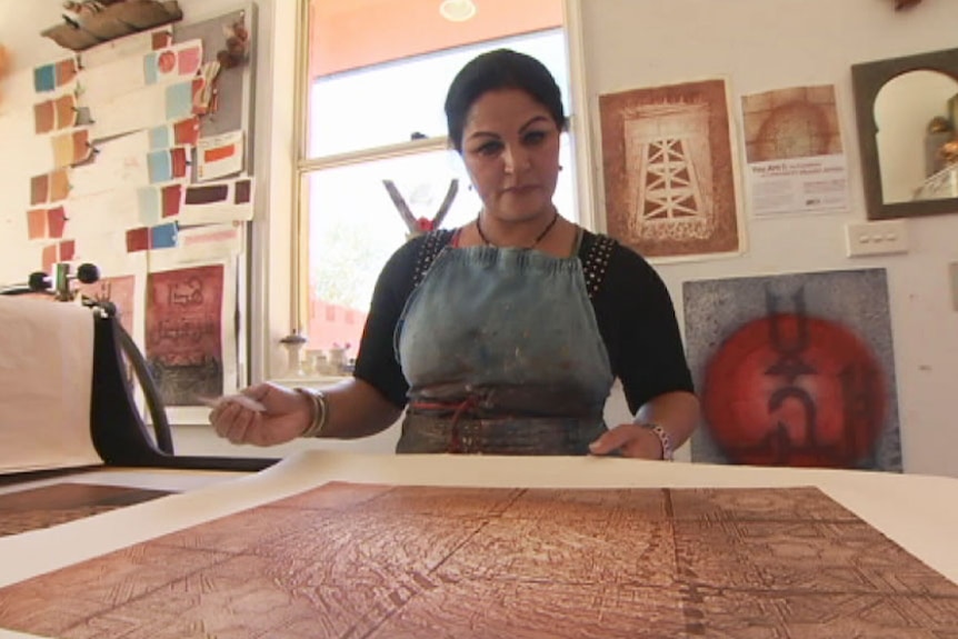 Moroccan-born artist Fatima Killeen working in her Canberra studio.