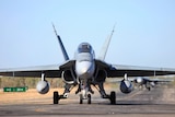 A RAAF F/A-18 taxis on a runway in Katherine.