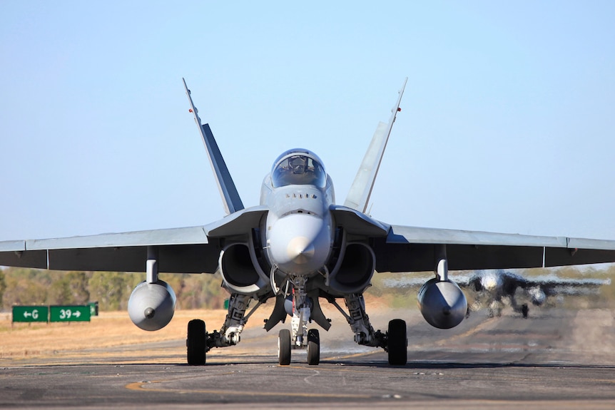 A RAAF F/A-18 taxis on a runway in Katherine.