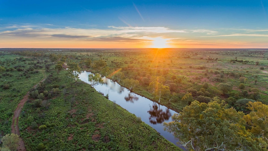 Sunset over a suddenly teeming creek near Warburton, Western Australia.