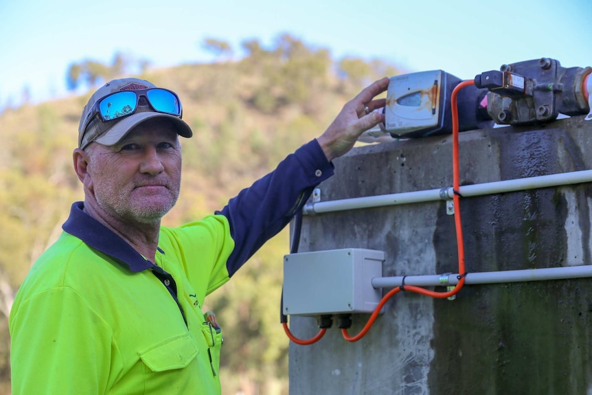 Stephen Jones, a waste water operator for Warrumbungle Shire Council, with one of Coonabarabran's new bores.