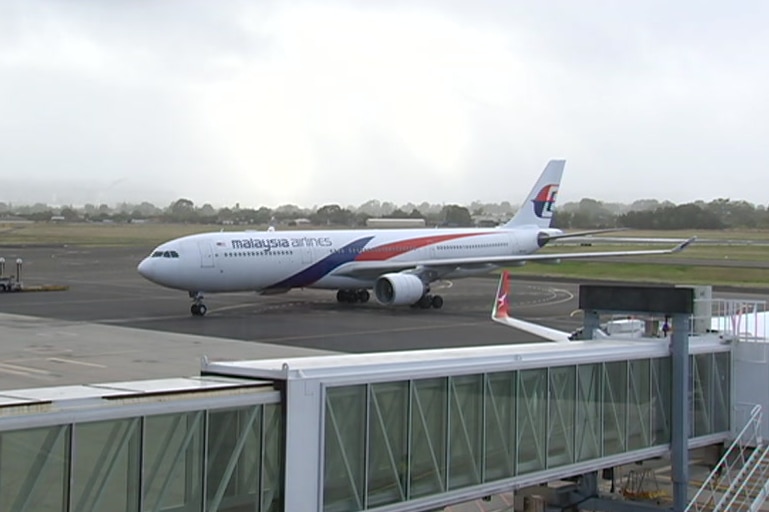 An aeroplane on the ground at an airport