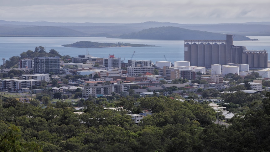 An industrial city on the edge of the sea.