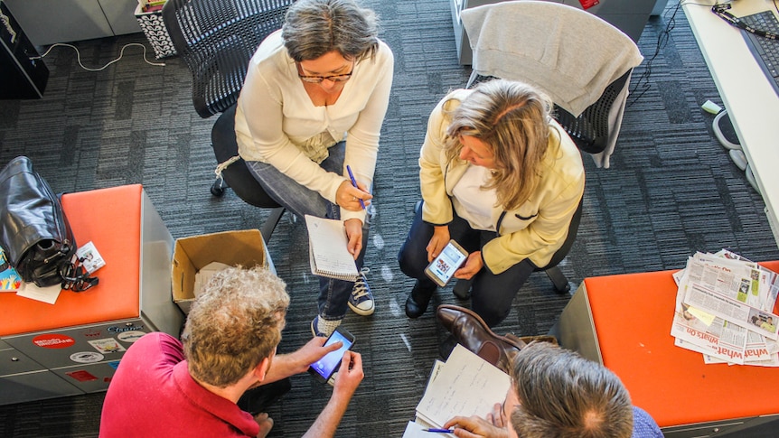 A group working together to make a decision.