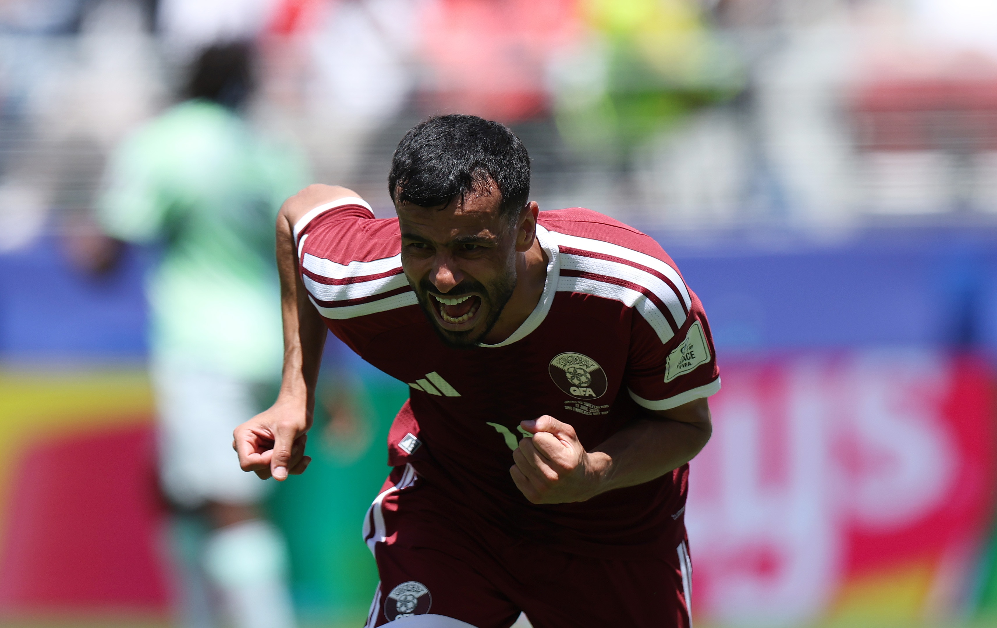 Boualem Khoukhi celebrates