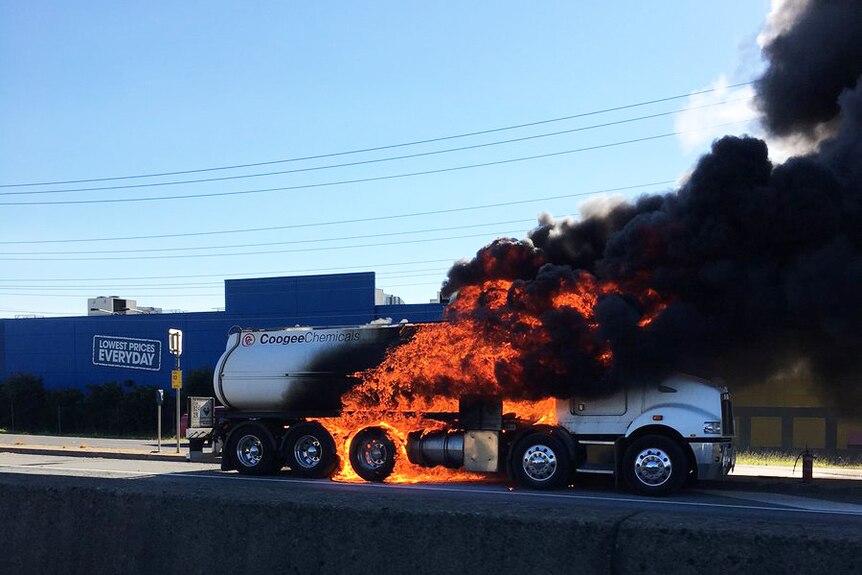Truck on fire on the M1 at Loganholme, south of Brisbane