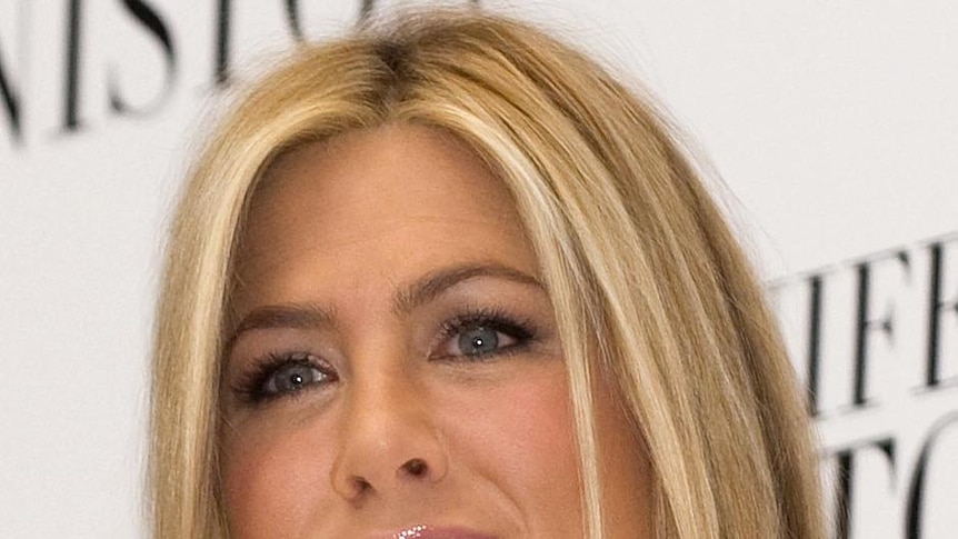 Jennifer Aniston poses for photographers during a press conference