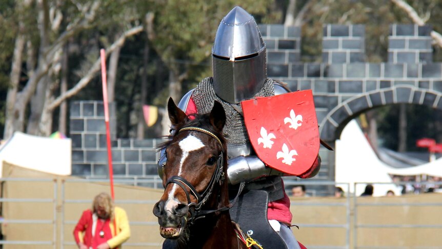 Justin Holland circles the jousting arena at the Abbey Medieval Festival on July 7, 2012.