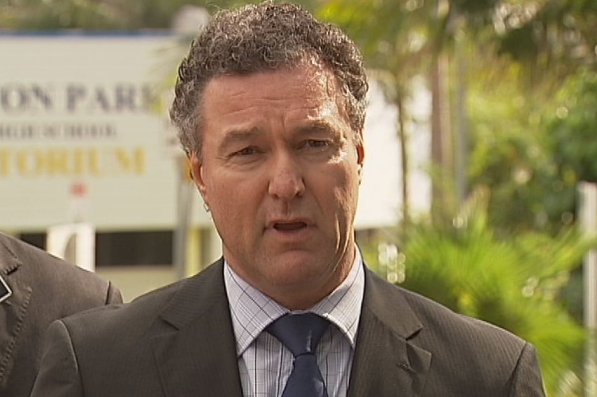 TV still of Qld Education Minister John-Paul Langbroek in Brisbane announcing school closures, Tues Sept 17, 2013