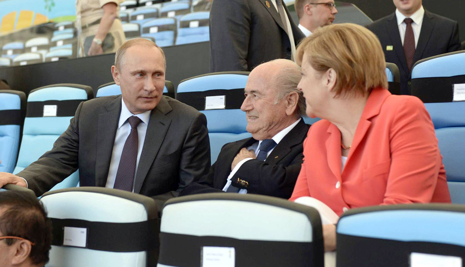 Sepp Blatter with Vladimir Putin and Angela Merkel