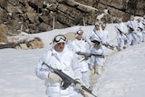 Turkish soldier on patrol in the snow