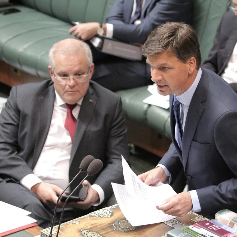 Angus Taylor speaks at the House of Representatives despatch box as Scott Morrison watches on