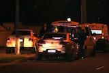 Police investigate at the scene of a suspicious death in Dianella