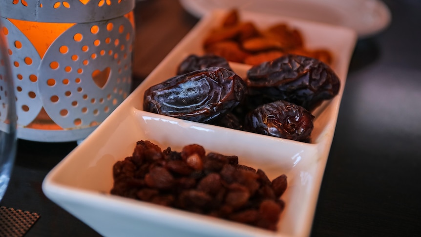 An assortment of dates in a tray.