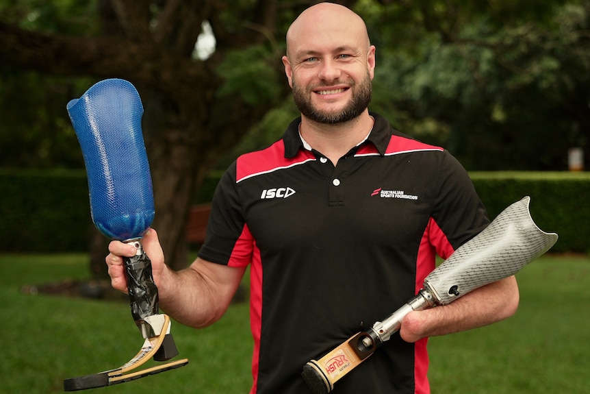 Australian wheelchair rugby player and Paralympic medallist Chris Bond OAM with the prosthetic leg found at Kings Beach.