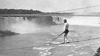 Stephen Peer crossing the Niagara Falls on a tightwire in 1887