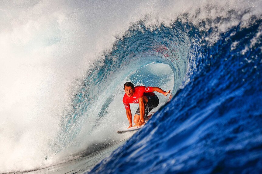 Julian Wilson negotiating a tight wave in Fiji.