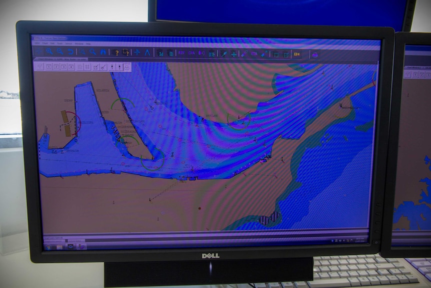 A computer screen shows a map of ship movements in Newcastle.