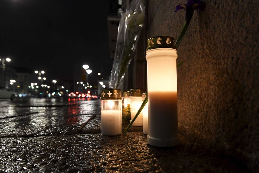 Memorial candles outside the Swedish Embassy in Helsinki.