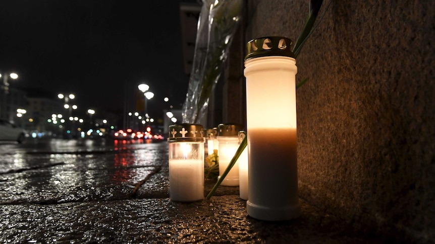 Memorial candles outside the Swedish Embassy in Helsinki.